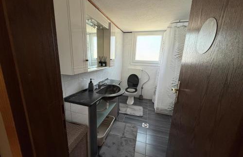 Cozy Family House with Yard - Photo 8