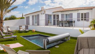 Villa Ernest, 100 m plage Saint Martin de Ré, quartier recherché de la Cible, calme absolu, piscine chauffée - Foto 3, sunbed