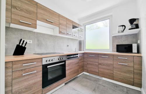 Tolstov Apartments - Monteurwohnungen - 3 Schlafzimmer - Küche - Balkon - Waschmaschine - 25 Min zur Messe DUS - Foto 3