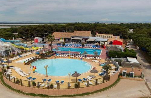 Joli Bungalow 464, 4-6 pers, wifi, terrasse, Camping Siblu Lac des Rêves Lattes - Foto 16