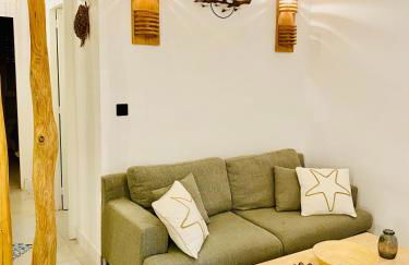 Les pieds dans le sable - Foto 1