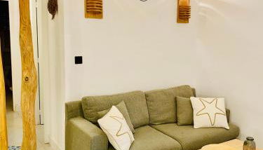 Les pieds dans le sable - Foto 1