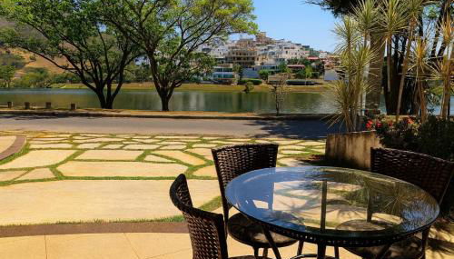 Suíte com Vista para o Lago em Capitólio em Escarpas do Lago - Foto 2, Garden view