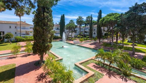 Elegant Marbella Apartment, 5-Pool Oasis, Sunlit Terrace, Garage - Photo 1, Garden, Garden view