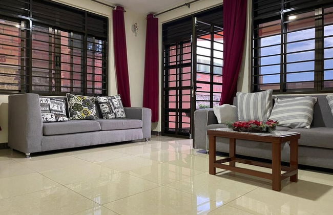 The Mugabi's Spacious Private Room - Foto 14