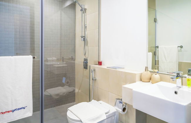 HomesGetaway-2BR Apt in 1 Residences - Photo 25