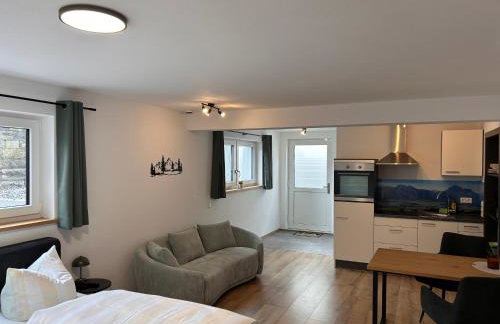 Apartment im Souterrain mit Terrasse - Foto 4