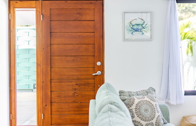 Ultramodern Townhome with an Inviting Coastal Design and Lush Outdoor Oasis with a Private Pool - Photo 16