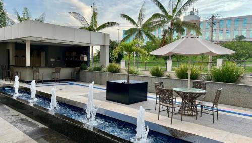 Flat aconchegante - Perto de Tudo - Vista Livre - Estacionamento privativo e Portaria 24h - Wi-Fi 600mbps - Foto 2, Garden, Garden view