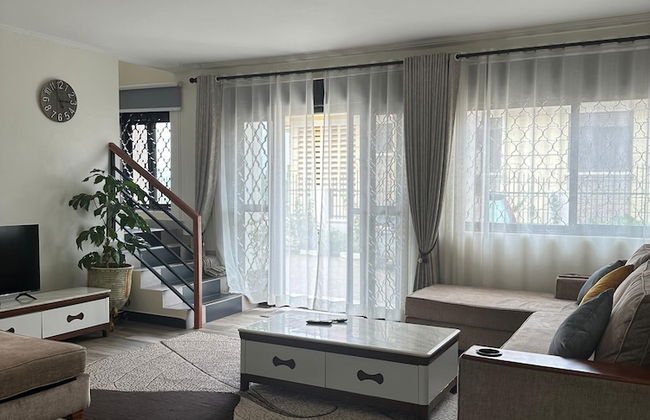 Divine Furnished Apartments - Foto 8