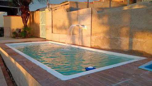 Casa 4 quartos, 2 suítes, piscina e acessibilidade - Frente para a lagoa - Foto 3