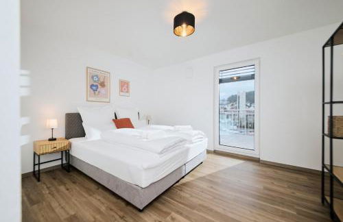 Rent4Living Apartments WLAN I kostenfreie Tiefgarage I Therme 5 Minuten zu Fuß I Barrierearm - Photo 13