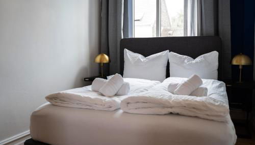 JUNIK Apartments - Deine Cityapartments in Duisburg - Photo 3, towels