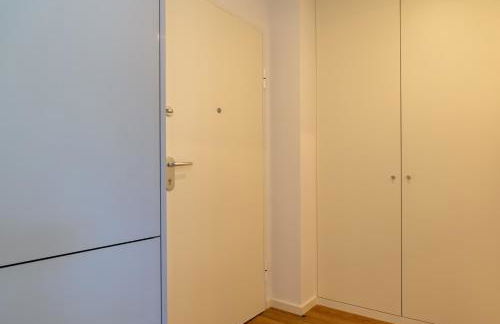 Sleek & Modern Flat w/ Private Garage by HostWise - Photo 28