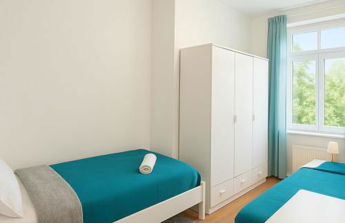 Monteurszimmer Move-in2Stay - Einzelbetten, Smart TV, Wifi - Foto 26