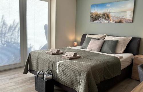 Kleine Auszeit -- inklusive Parkplatz & WiFi, Geschirrspüler, Waschmaschine & Terrasse mit Strandkorb -- Perfekt für Urlaub & Business - Foto 1