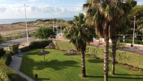 Apartamento con piscina en una preciosa playa - Foto 5, Garden view
