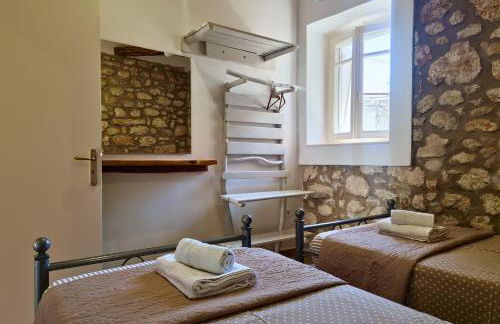 Alekos Cozy Stone 2BR Home Karya Center - Photo 17