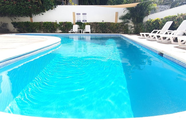 Costambar Ocean Breeze - Beachfront Apartment With Pool - Photo 7
