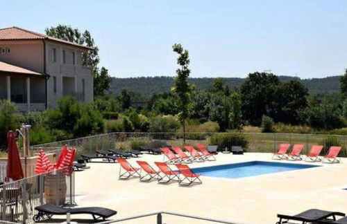 Le soleil d Eugènie appartement dans résidence avec Piscine commune près de Carcassonne - Foto 1