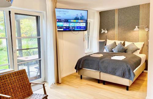 Snug Stays 2 - Design Studio am See mit Terrasse, Garten, 40m vom See - Foto 18