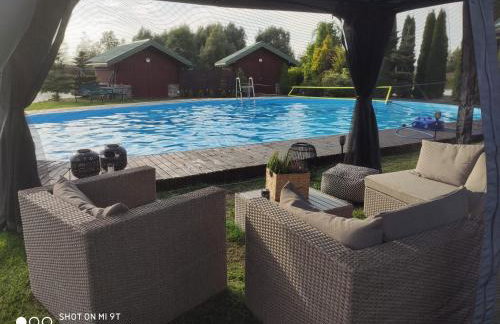 Dom nad stawem przy lesie - Foto 25