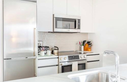 Entire Apt Downtown Seaport with Pool - Photo 13