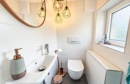 Souterrain Apartment mit eigenem Eingang und Terasse - Foto 8