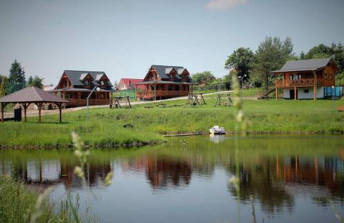 Domki cało roczne z własnym stawem nad jeziorem - Foto 22