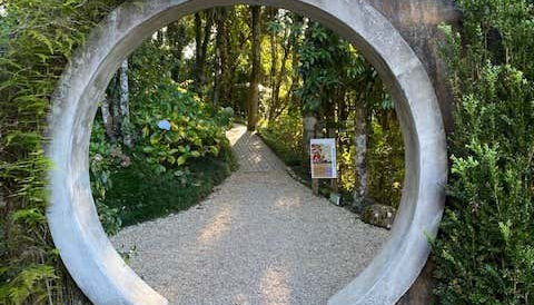 The park has numerous tree-lined paths