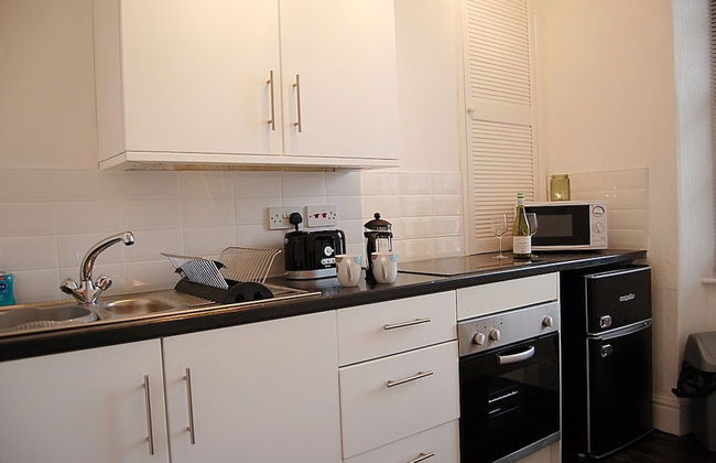 CLOCK TOWER APARTMENTS - Photo 19