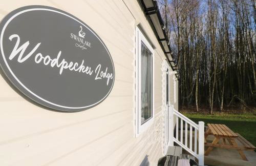 Woodpecker Lodge - Photo 1