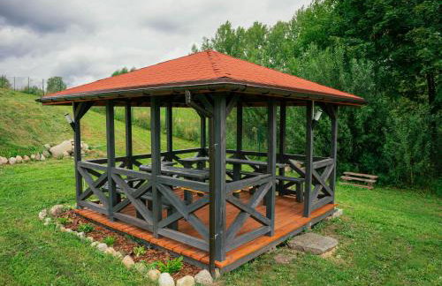 Domek na Mazurach nad stawem z jacuzzi - Photo 10