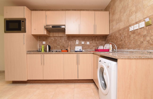 OYO Home 2351BHK Capitol Tower DIC - Photo 10