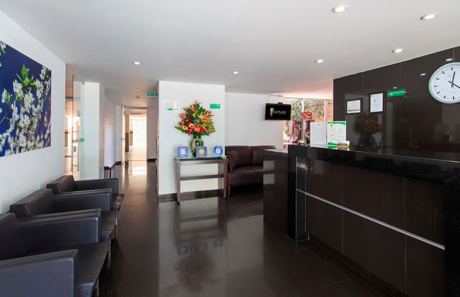 122 Plaza Apartahotel - Photo 2