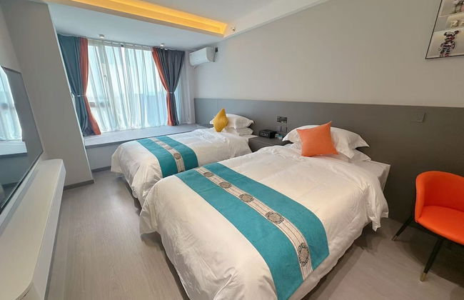 Qin Mengli Hotel - Photo 7