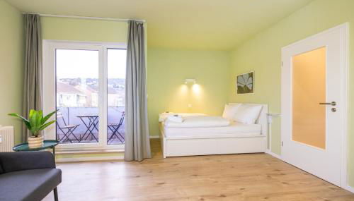Ruhiges Apartment mit Stellplatz nahe Innenstadt & Main - Foto 4