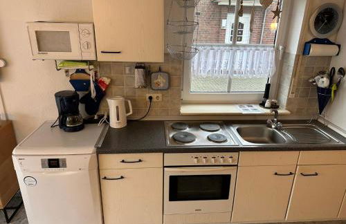 Carolinensieler-Koje -- Nordsee-Ferienhaus mit Charme in Altfunixsiel - Foto 4