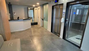 Home Time Studios - Foto 4, Lobby or reception