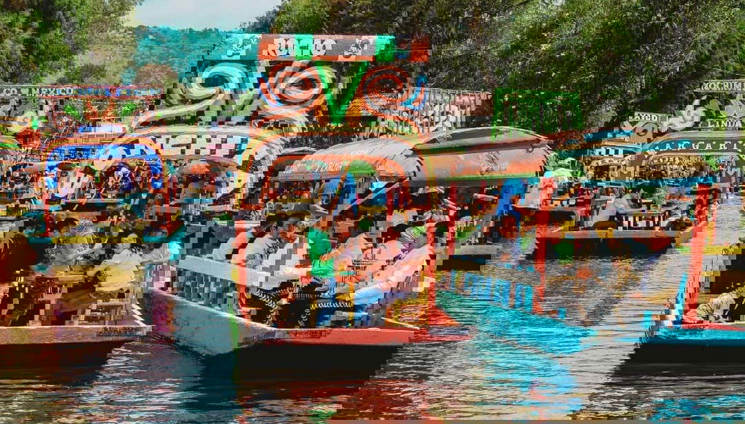 Sailing in trajineras through the canals of Xochimilco