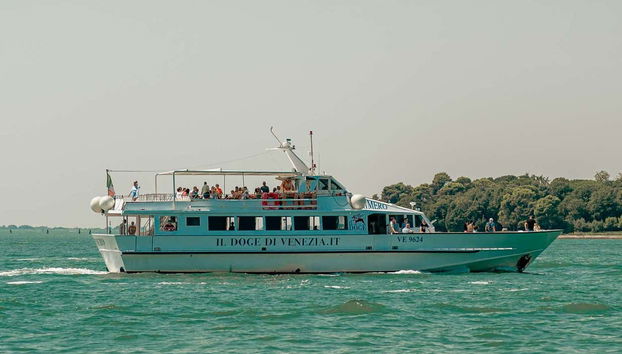 Sunset Boat Cruise - Photo 5, The boat sailing through the waters of Venice before sunset