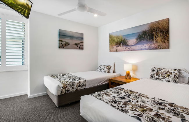 Peninsular Beachfront Resort - Photo 16