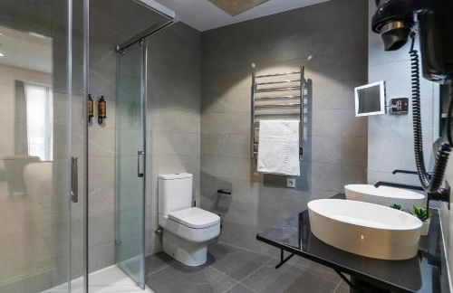 Aquitania Home Suites - Photo 43