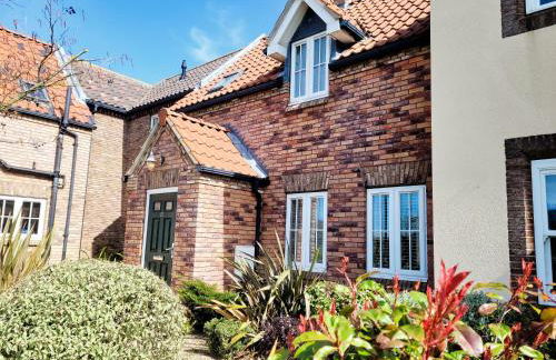 Puddleduck Cottage - Part of the The Bay Filey Holiday Village with pool, gym and direct beach access, pub, restaurant, tennis and meadows walks - Foto 2