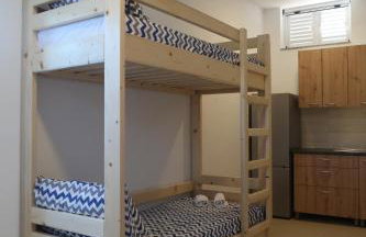 Robinson olive tree huts - Photo 37