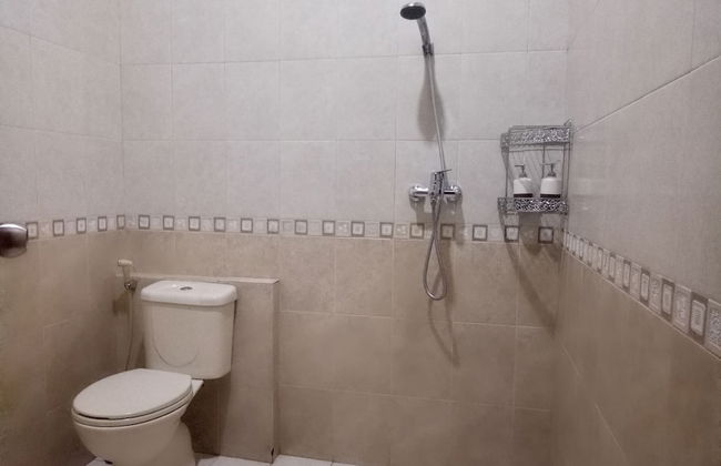 T-Rooms Homestay Bandara - Foto 19