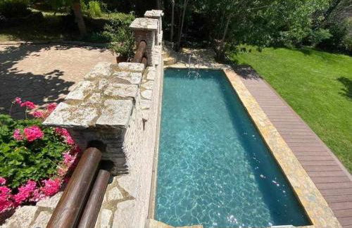 Masía de piedra con piscina - Foto 35