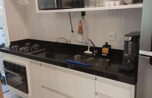 Apartamento novo a 350 m da praia das Toninhas em Ubatuba - 2 dormitórios sendo 1 suite, piscina, varanda gourmet com churrasqueira, ar condicionado, cozinha completa, garagem privativa - Foto 57