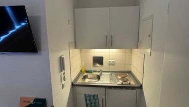 Mikroapartment mit Küchenzeile und Bad - Foto 3, stove