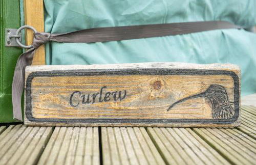 curlew - Foto 1